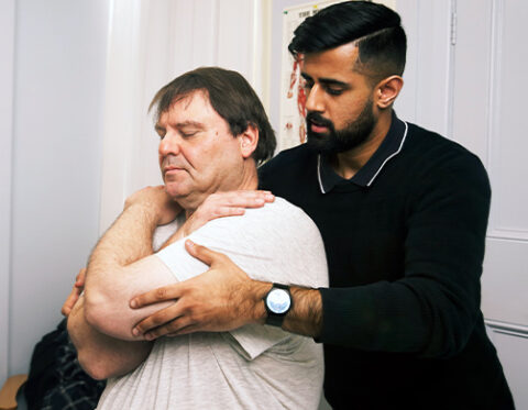 A male patient receives treatment at our Wellness Centre